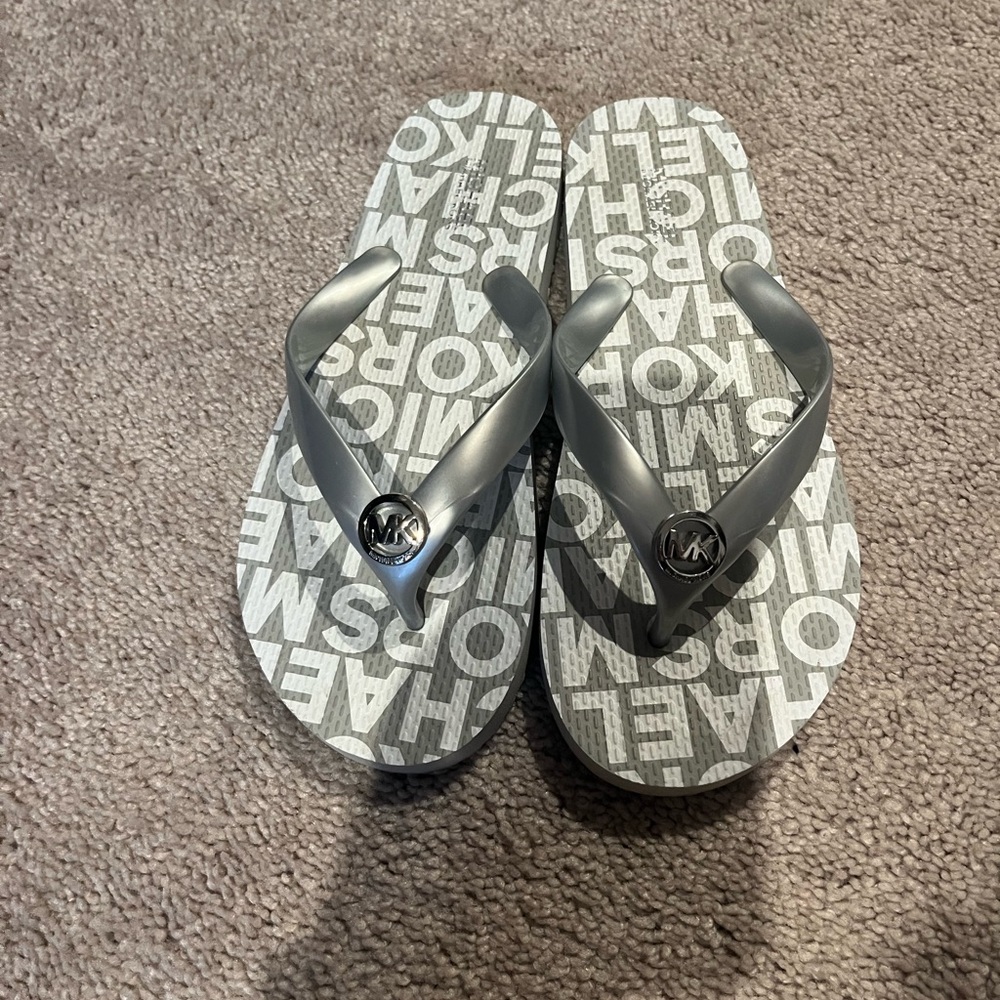 Michael Kor flip flops